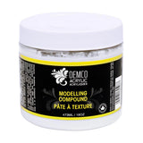 A white plastic jar of Demco Acrylics Modelling Compound with a black and yellow label, shown on a plain white background.